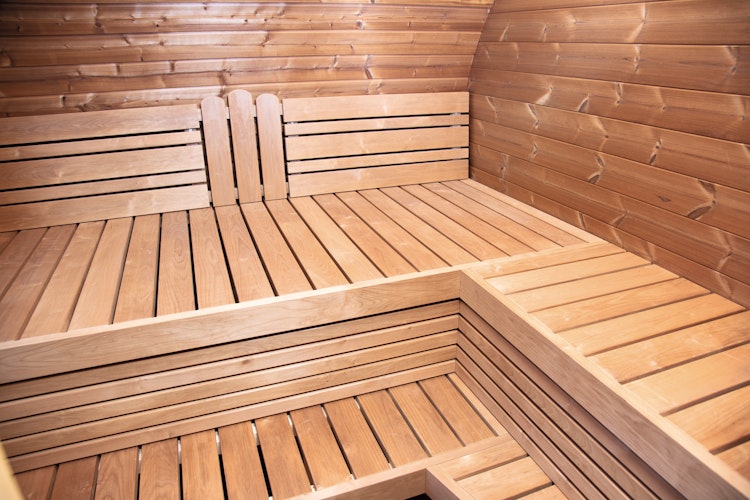 Wolff Finnhaus Saunahaus Steen in Ovalform inkl. schwarzen Dachschindeln